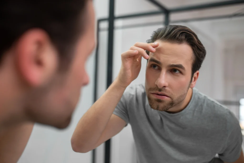 How long scalp micropigmentation lasts before fading in Pakistan